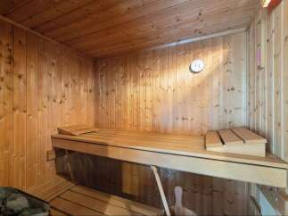 Step into relaxation with this inviting sauna.