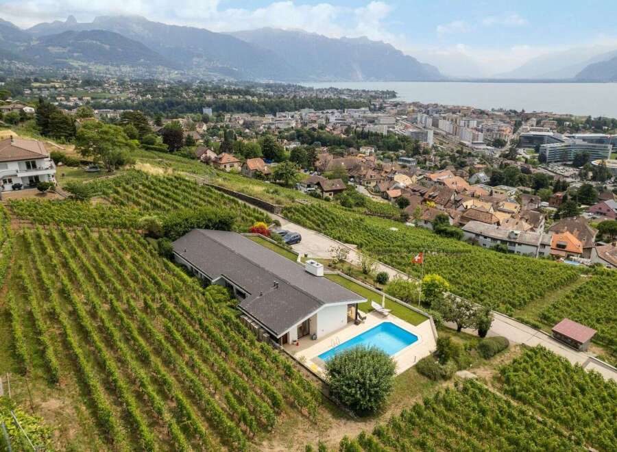 Discover a stunning property nestled in a picturesque vineyard setting, offering breathtaking views of the surrounding landscape.