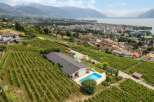Discover a stunning property nestled in a picturesque vineyard setting, offering breathtaking views of the surrounding landscape.