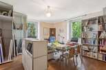 This stunning office space boasts a bright and airy atmosphere, perfect for productivity.