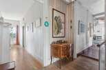 Step into this charming home and be greeted by a warm and inviting hallway.