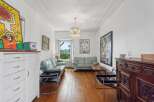 Discover this charming property featuring a bright and airy living room, perfect for relaxation and entertaining.
