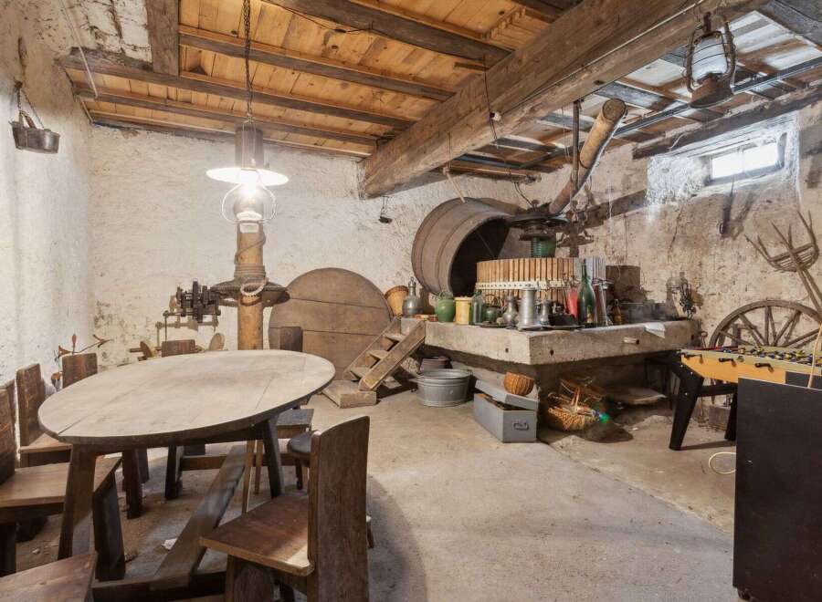 Step back in time with this unique property featuring a rustic wine cellar.