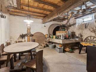 Step back in time with this unique property featuring a rustic wine cellar.