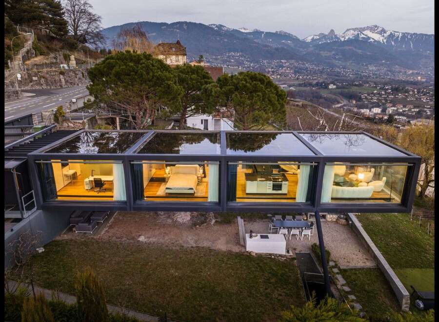 Experience luxury living in this stunning modern home with panoramic views.