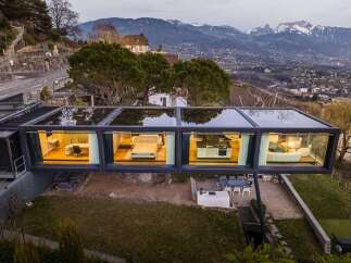 Experience luxury living in this stunning modern home with panoramic views.