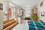 This charming kitchen features a bright and airy design, perfect for culinary enthusiasts.