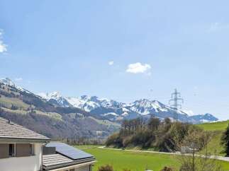 Experience breathtaking mountain views from this stunning property.