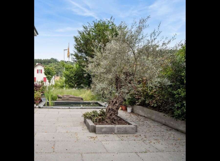 Discover a serene outdoor oasis with this stunning property.