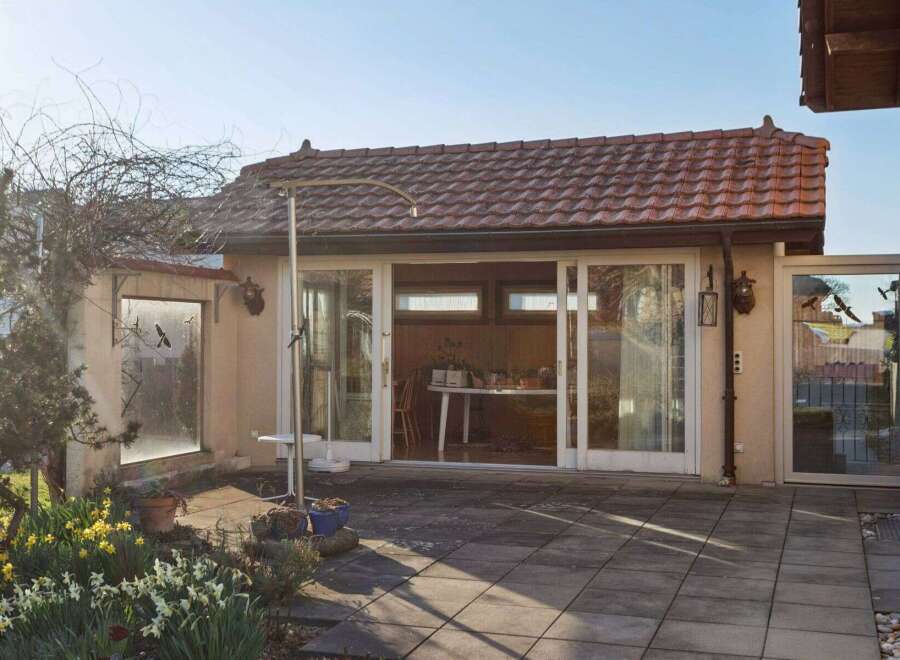 Discover this charming property featuring a cozy patio and a sunlit interior.