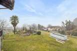 Discover this charming property featuring a spacious backyard, perfect for outdoor activities and relaxation.