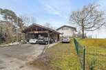 Discover this charming property featuring a covered carport, perfect for protecting your vehicles from the elements.