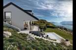 Experience luxury living in this stunning modern home with breathtaking views.