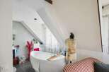 Discover the charm of this unique bathroom, featuring a stylish bathtub and a creative design.