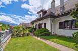 Discover this stunning property featuring a charming exterior and lush landscaping.