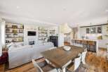 This stunning property boasts a spacious open-plan living area, perfect for modern family living and entertaining.