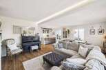 This stunning property boasts a spacious open-plan living area, perfect for entertaining.