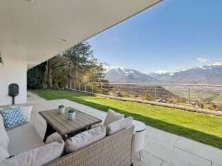 Experience breathtaking mountain views from this stunning property.