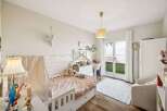 This charming bedroom offers a cozy and inviting atmosphere, perfect for a child's sanctuary.