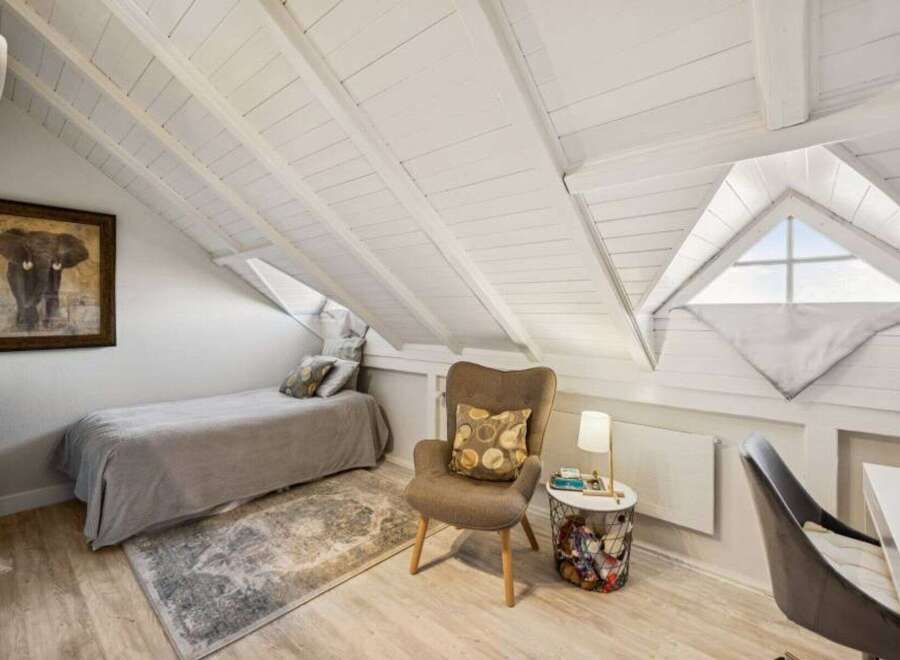 Discover the charm of this unique attic space, perfect for a cozy retreat.