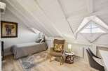 Discover the charm of this unique attic space, perfect for a cozy retreat.