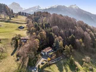 Discover a stunning property nestled in the heart of nature, offering breathtaking mountain views and a serene atmosphere.