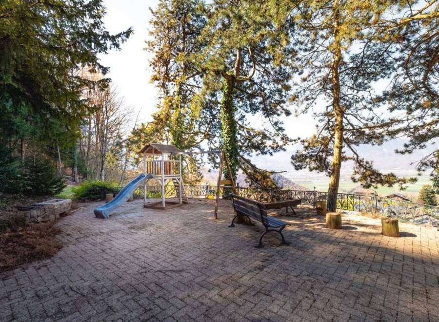 Discover a charming outdoor space perfect for relaxation and play.