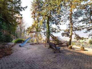 Discover a charming outdoor space perfect for relaxation and play.