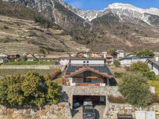 Discover this stunning property nestled in a picturesque mountain setting.