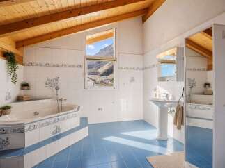 Step into a bright and airy bathroom featuring a unique design.