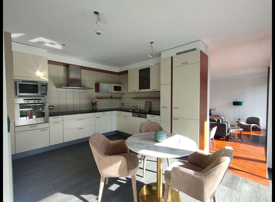 This stunning kitchen boasts modern design and functionality.