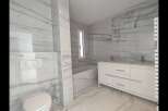 Step into luxury with this stunning modern bathroom.
