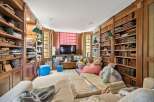 Step into a world of literary charm with this stunning library.