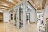 This stunning property boasts a modern elevator, seamlessly blending functionality with elegance.