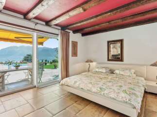 Experience luxury living in this stunning bedroom with breathtaking views.
