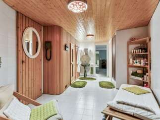 Step into a serene spa-like retreat with this inviting space.