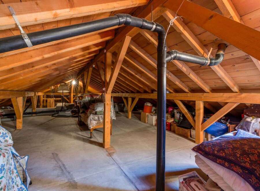 Discover the potential of this spacious attic, perfect for storage or conversion.