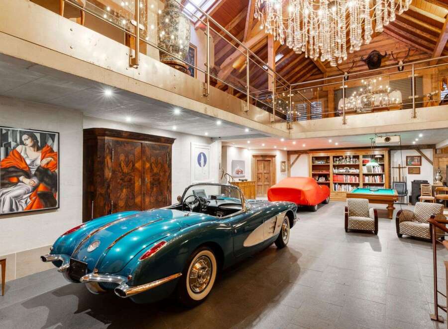Step into luxury with this stunning property featuring a classic car collection and a sophisticated interior.