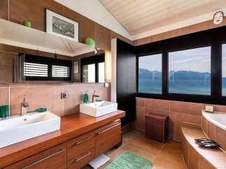 This luxurious bathroom boasts stunning views and modern design.