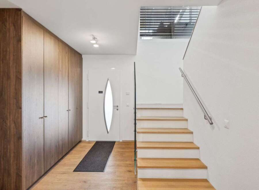 Step into modern elegance with this stunning entryway.