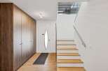 Step into modern elegance with this stunning entryway.