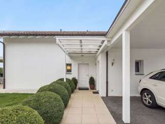 Discover this stunning property featuring a modern design and immaculate curb appeal.