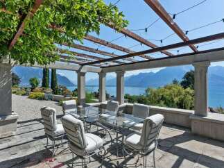 Enjoy breathtaking views from this stunning outdoor dining area.