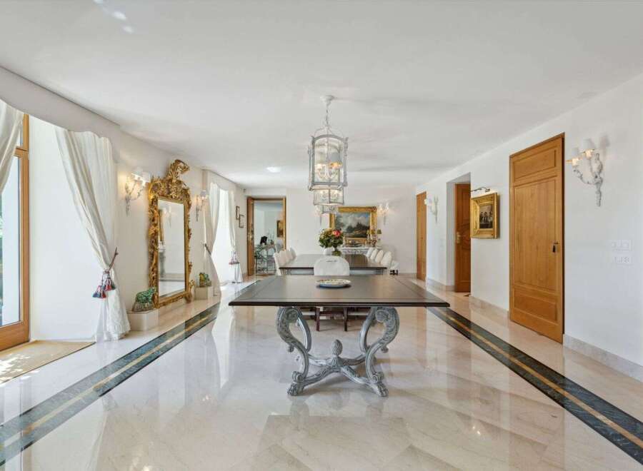 Step into luxury with this stunning property featuring a grand dining room.
