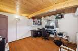 Discover the perfect home office setup in this inviting space! Featuring a stylish desk, comfortable chair, and ample storage, this room is designed for productivity and comfort.