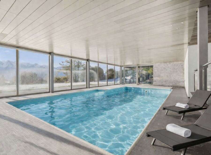 Experience luxury living with this stunning indoor pool.