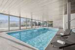 Experience luxury living with this stunning indoor pool.