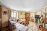 Discover the charm of this inviting living space, perfect for relaxation and entertaining.