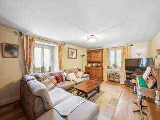 Discover the charm of this inviting living space, perfect for relaxation and entertaining.