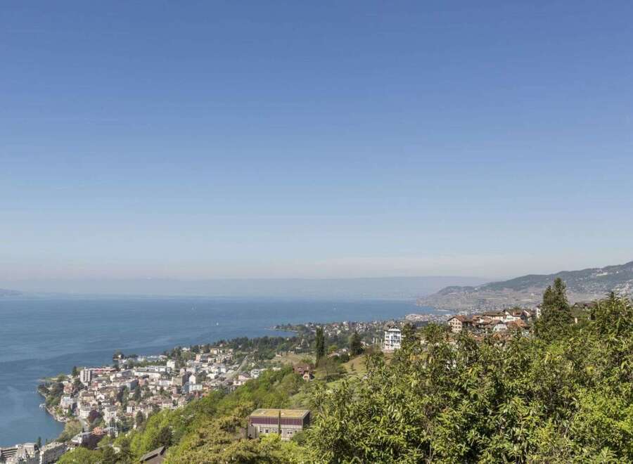 Enjoy breathtaking views from this stunning property! This home offers a serene escape with panoramic vistas of the lake and surrounding landscape.